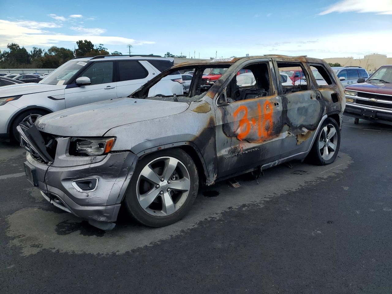 2014 Jeep Grand Cherokee Overland, VIN 1C4RJFCTXEC190859 — Vandalism