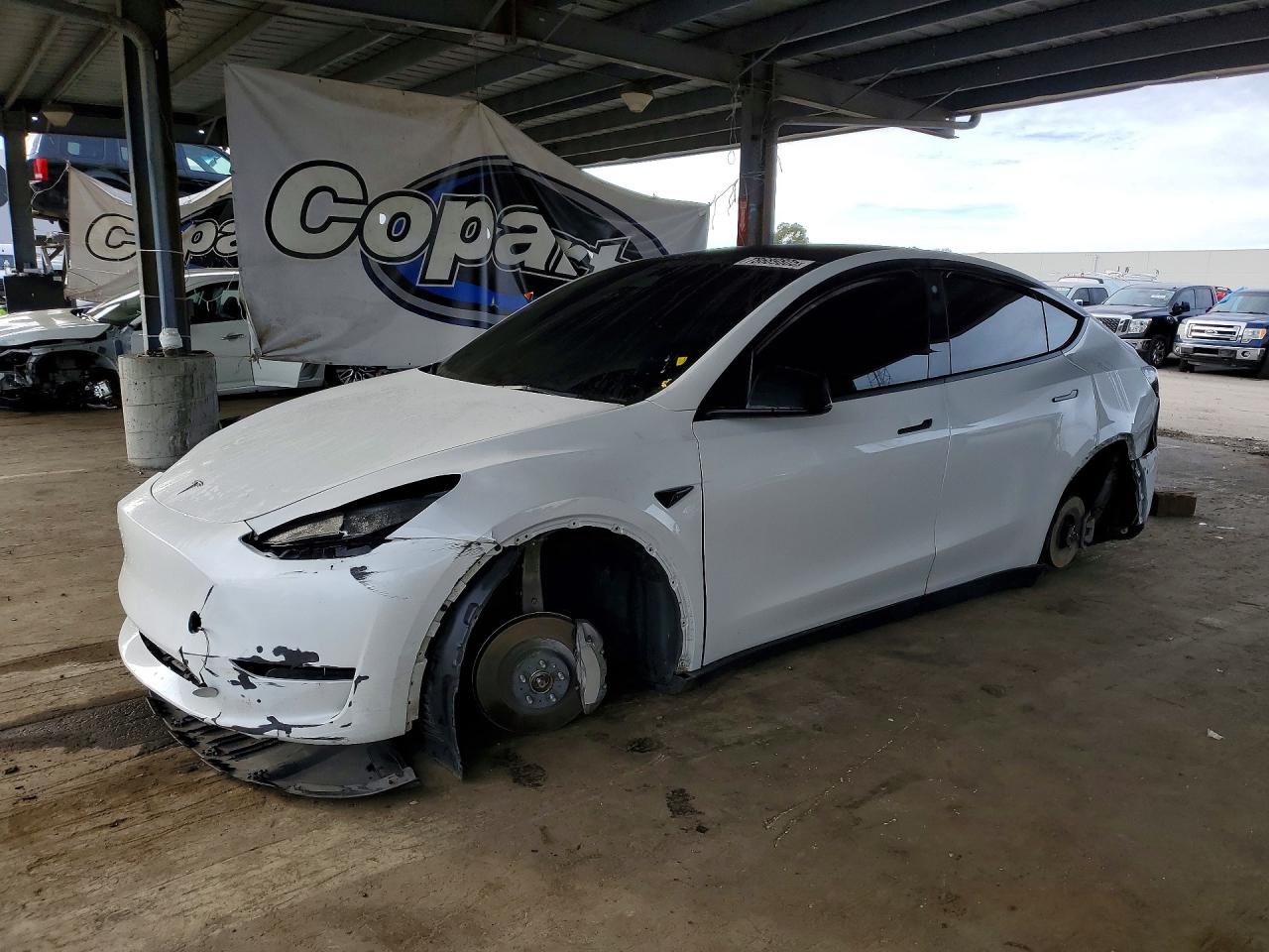 2023 Tesla Model Y Long Range, VIN 7SAYGDEE6PF693729 — Stripped