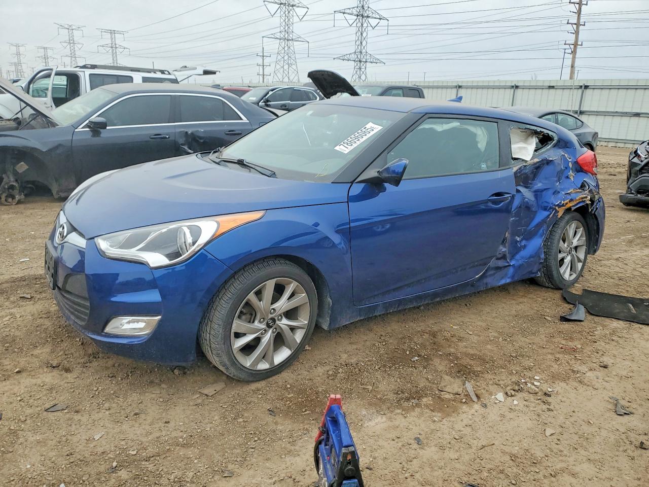 2017 Hyundai Veloster, VIN KMHTC6ADXHU317888 — Side