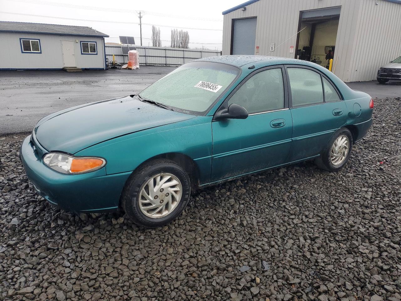 1997 Ford Escort LX, VIN 1FALP13P9VW361860 — Side