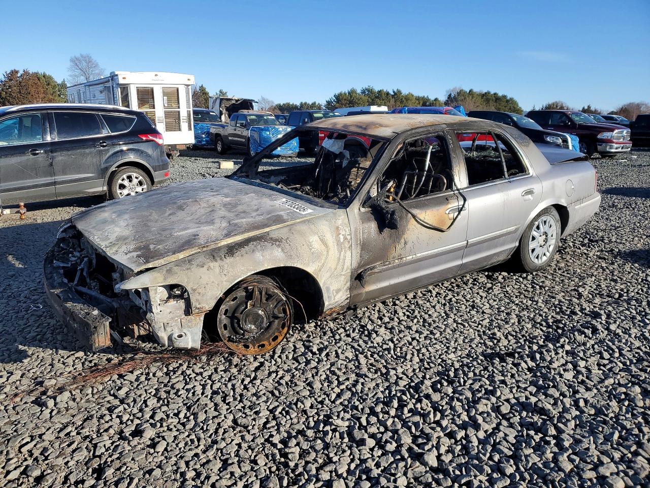 2006 Mercury Grand Marquis GS, VIN 2MEFM74V66X613701 — Burn
