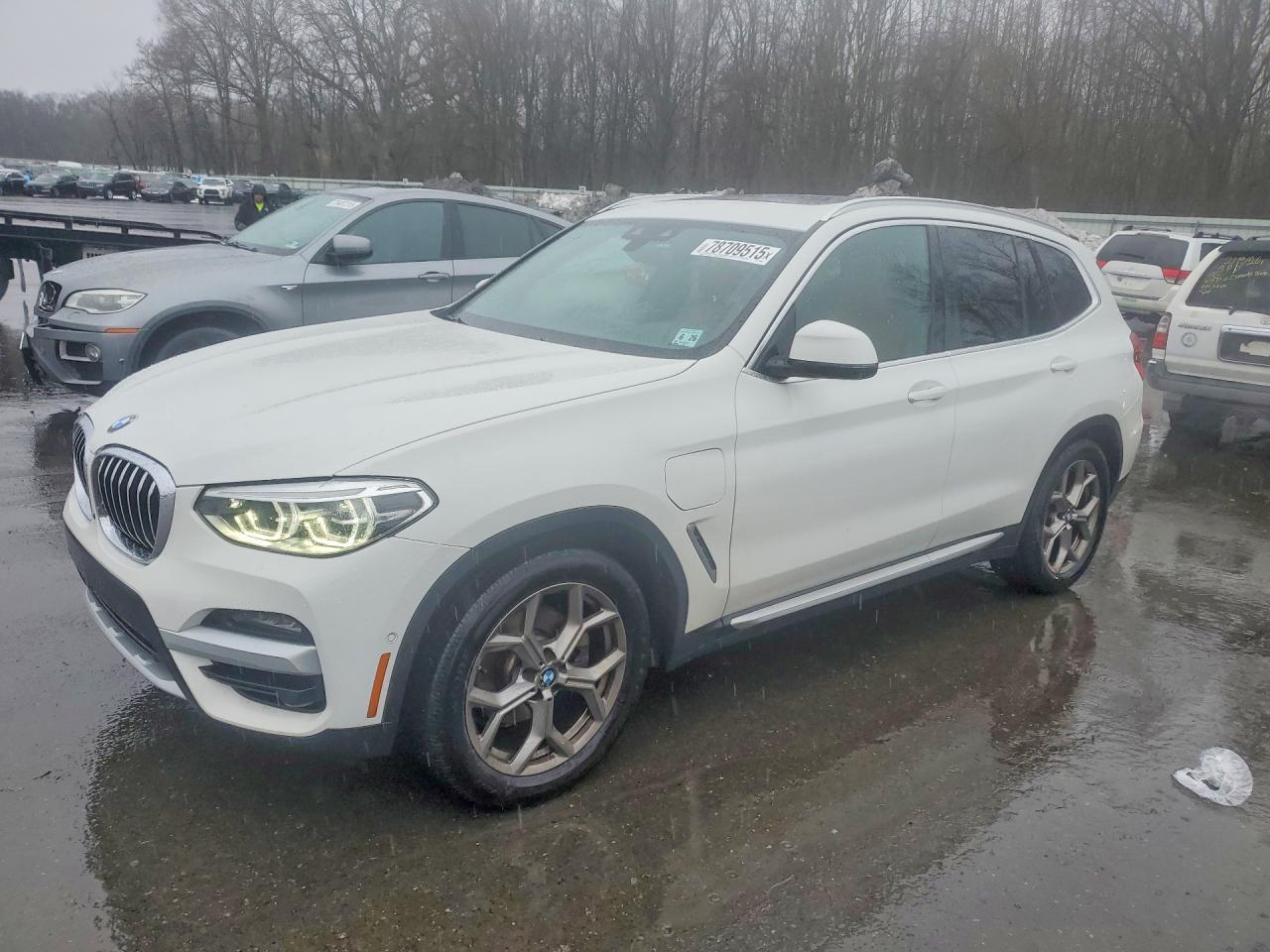 2021 BMW X3 xDrive30e, VIN 5UXTS1C00M9H70629 — Undercarriage