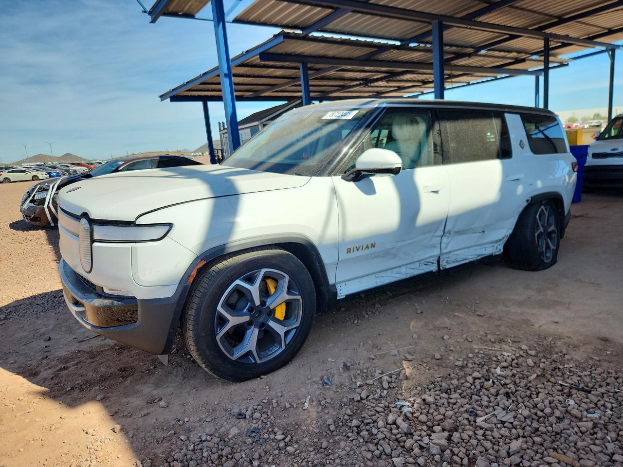 2024 Rivian R1S Adventure, VIN 7PDSGABA7RN036714 — Side