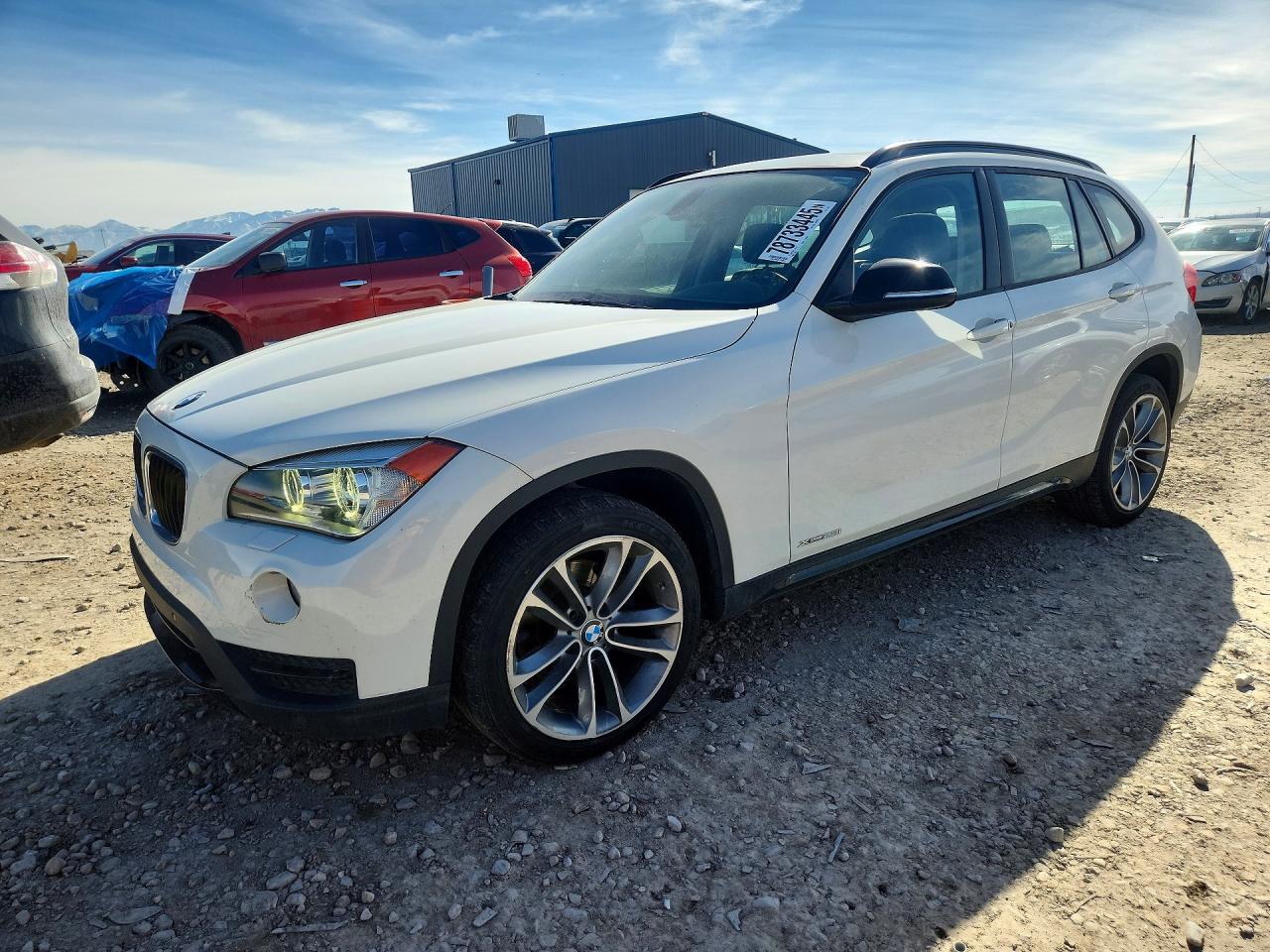 2014 BMW X1 xDrive28i, VIN WBAVL1C53EVY18811 — Фото с аукциона