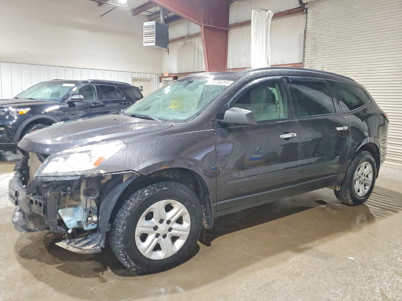 2017 Chevrolet Traverse LS, VIN 1GNKVFED8HJ259311 — Front end