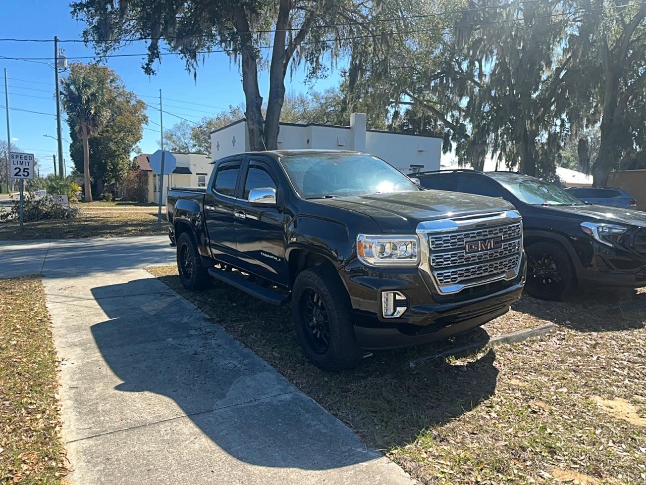 2021 GMC Canyon 2WD Denali, VIN 1GTG5EEN9M1171878 — Minor dents and scratches