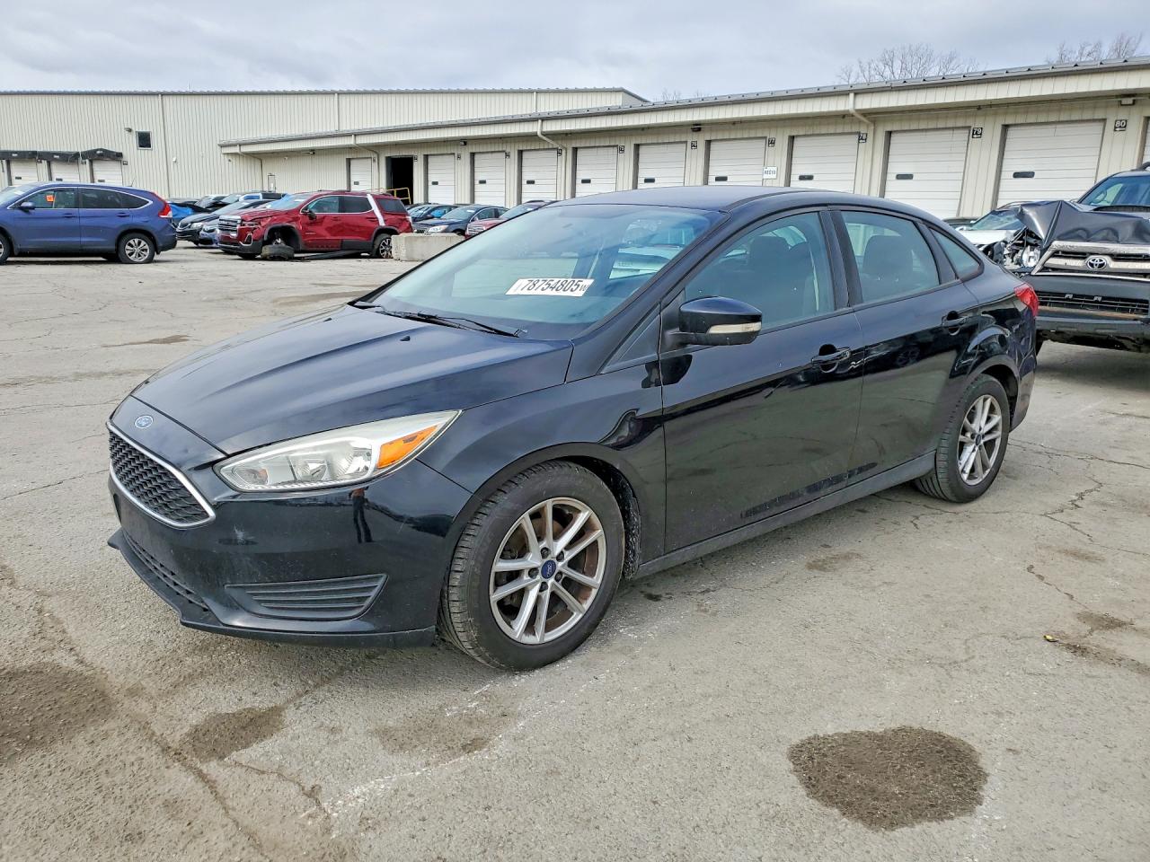 2016 Ford Focus SE, VIN 1FADP3F23GL252136 — Minor dents and scratches