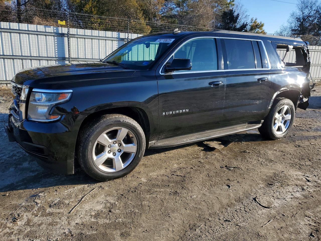 2015 Chevrolet Suburban LT, VIN 1GNSKJKC0FR285245 — Rear end