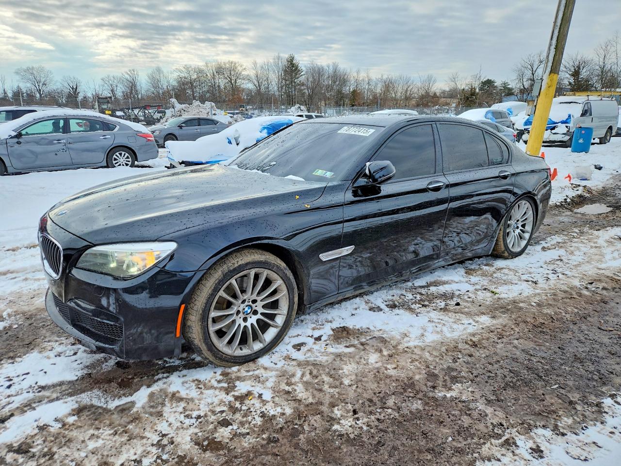 2013 BMW 7 Series 740i, VIN WBAYA6C5XDC994927 — Rear end