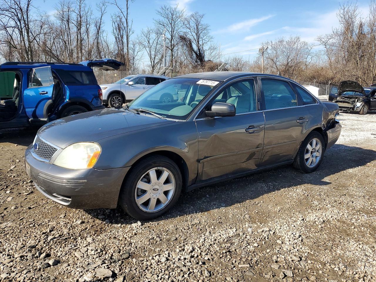 2005 Ford Five Hundred SE, VIN 1FAHP23145G101528 — Side