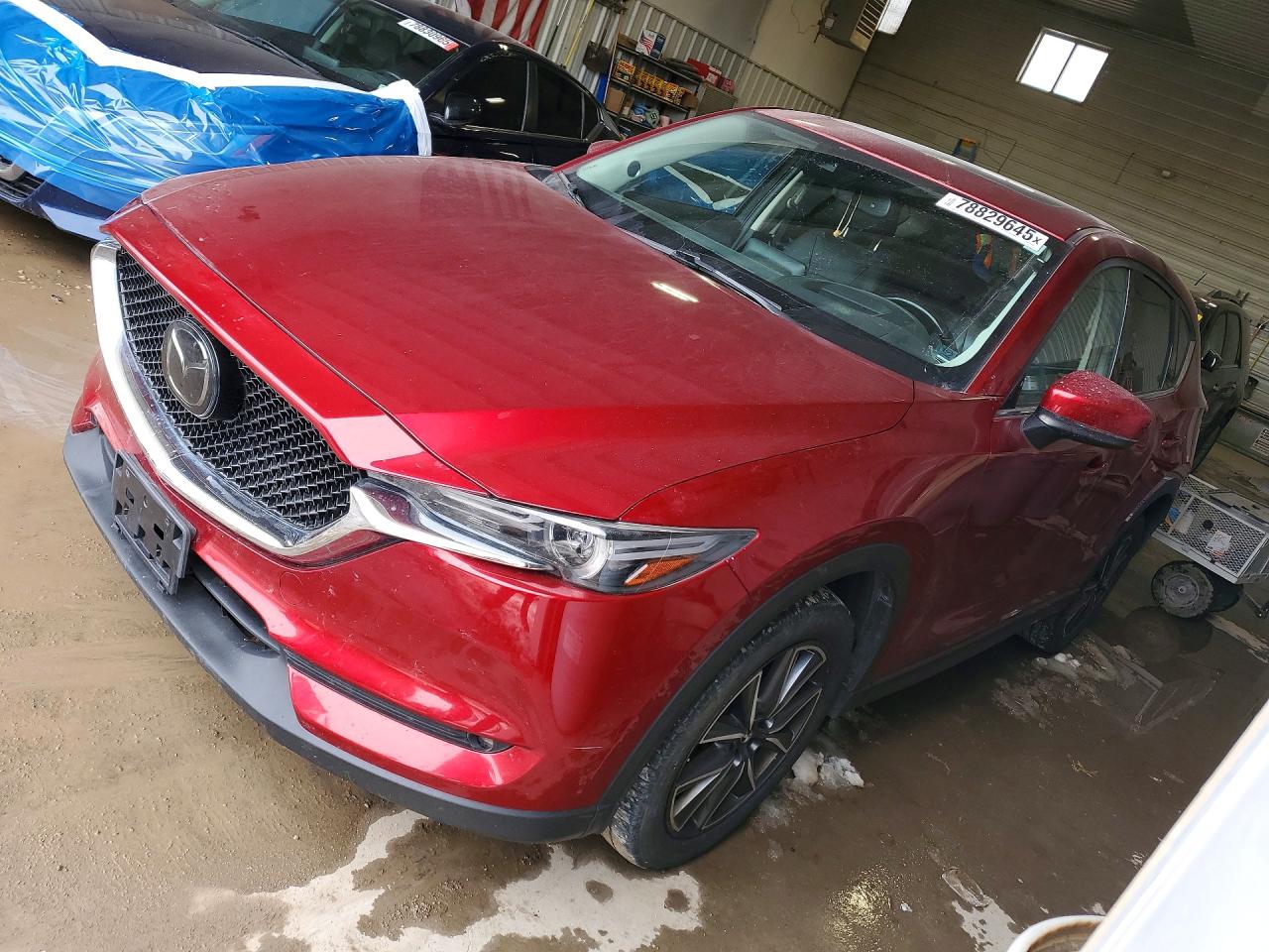 2018 Mazda CX-5 Grand Touring, VIN JM3KFBDM8J0347620 — Rejected repair