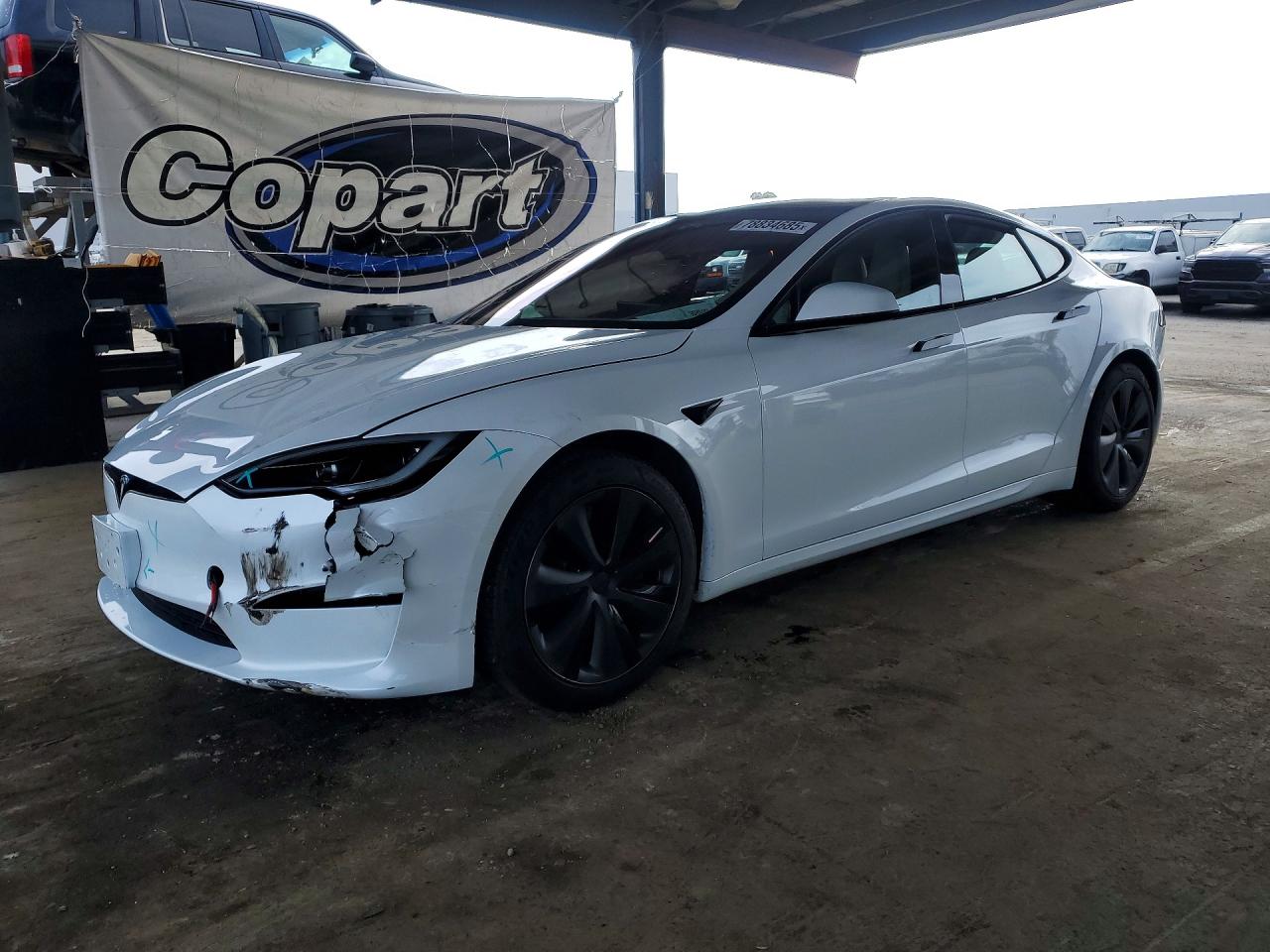 2024 Tesla Model S Plaid, VIN 5YJSA1E69RF542222 — Бок