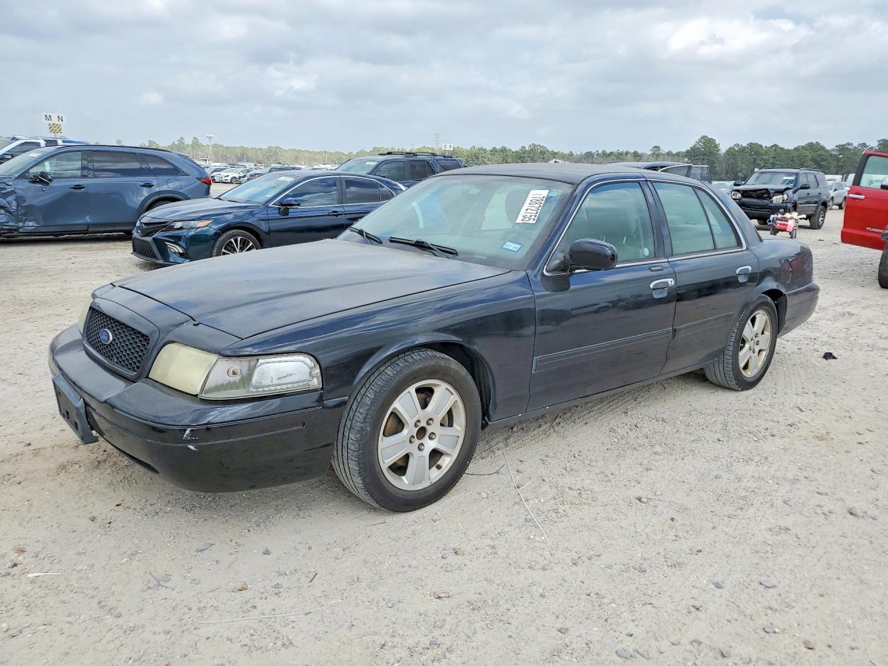 2011 Ford Crown Victoria LX, VIN 2FABP7EV4BX146199 — Normal wear