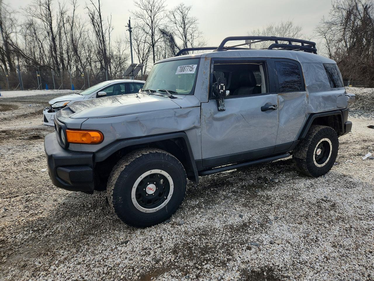 2013 Toyota FJ Cruiser, VIN JTEBU4BF7DK158640 — Side