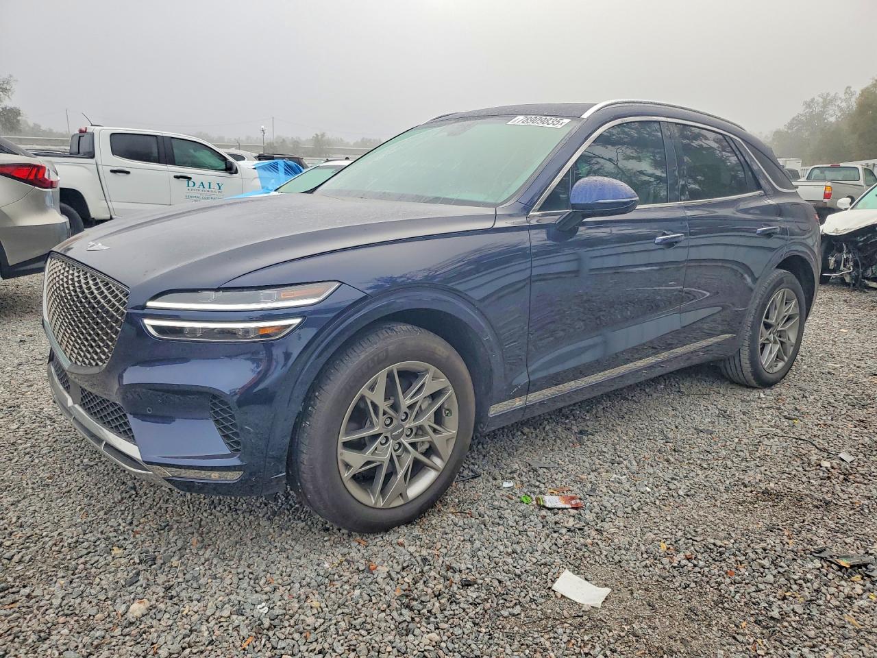 2024 Genesis GV70 2.5T, VIN 5NMMADTB7RH011318 — Side