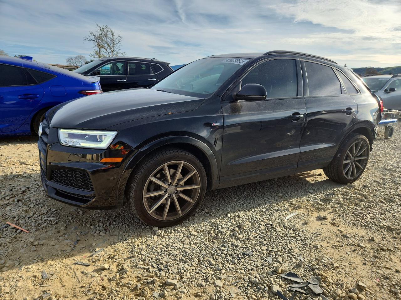 2018 Audi Q3 Premium Plus, VIN WA1JCCFS7JR011672 — Rear end