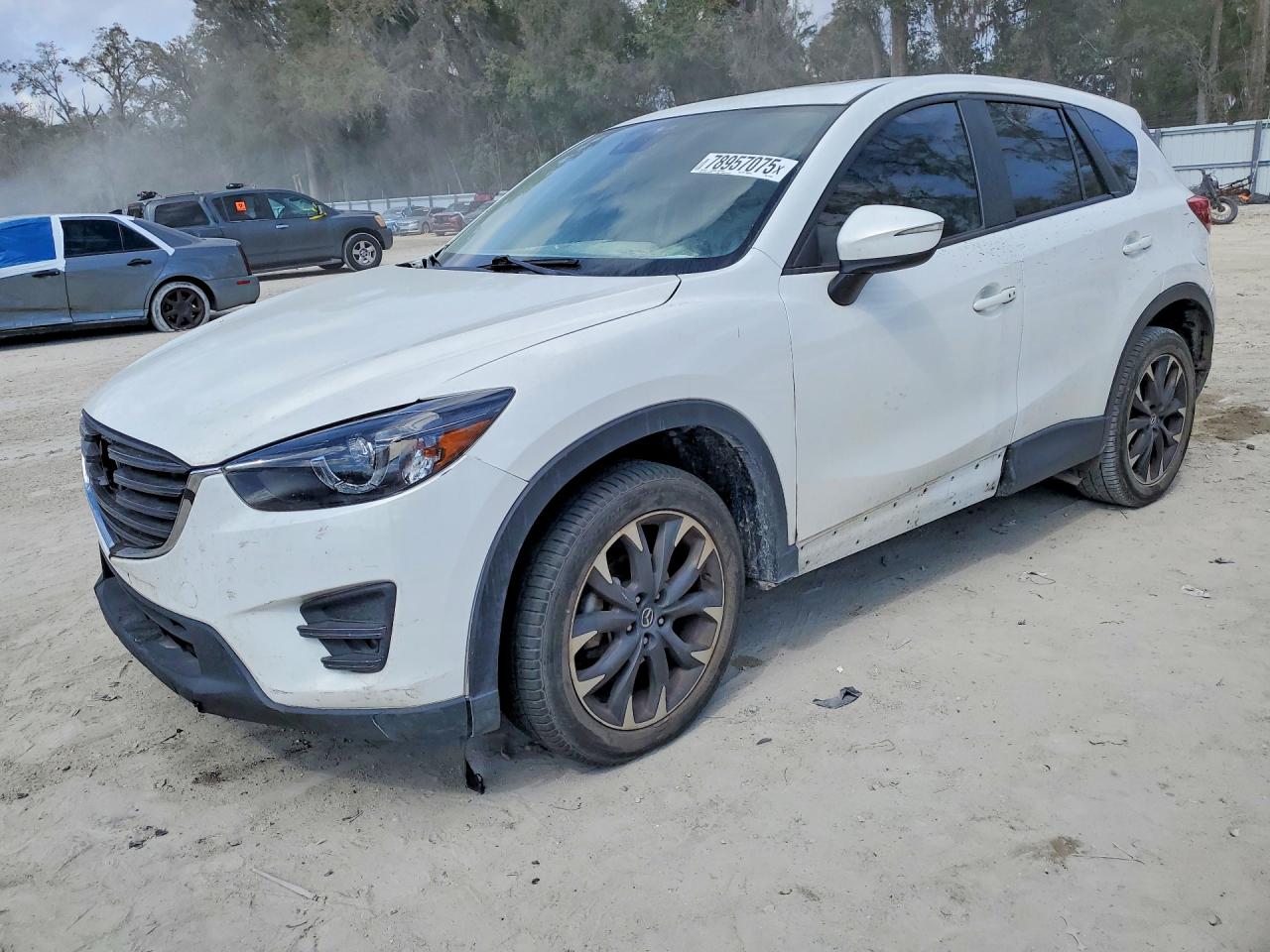 2016 Mazda CX-5 Grand Touring, VIN JM3KE2DY6G0696662 — Interior fire