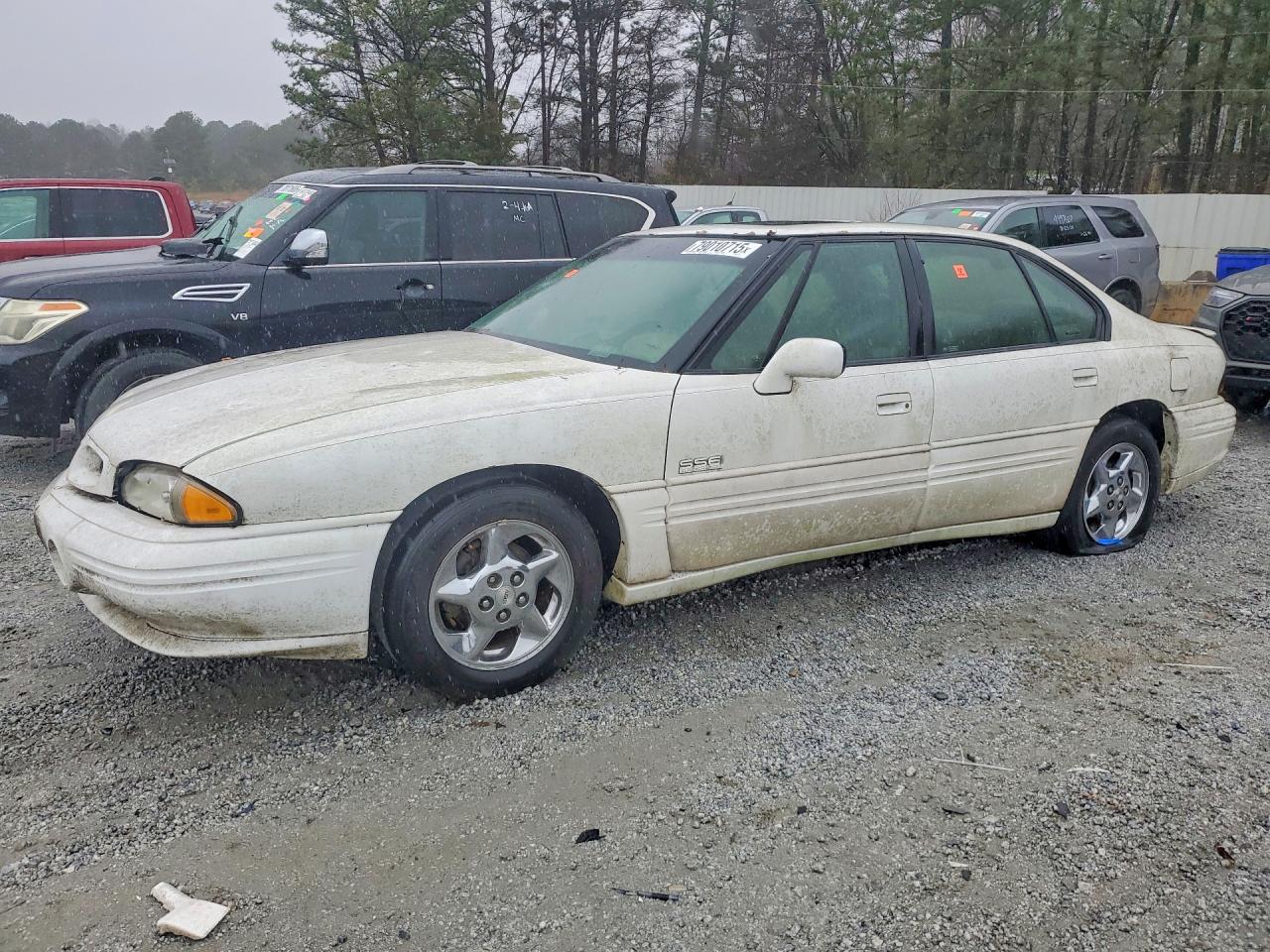 1999 Pontiac Bonneville, VIN 1G2HZ5214XH237408 — Minor dents and scratches