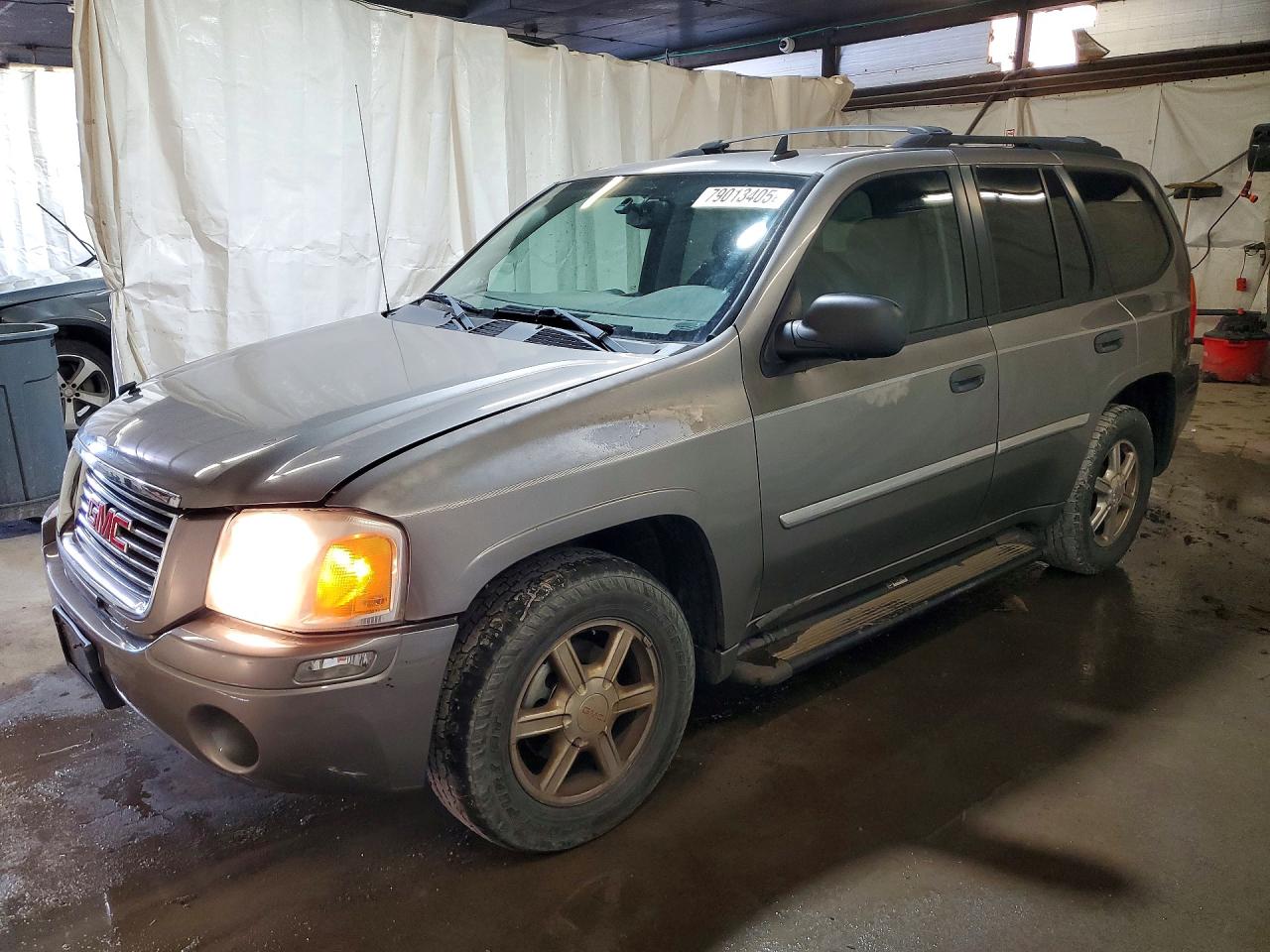 2009 GMC Envoy SLE, VIN 1GKDT33S592131017 — Normal wear