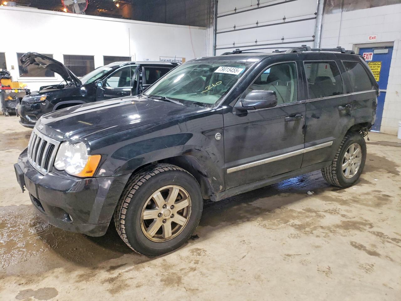2009 Jeep Grand Cherokee Limited, VIN 1J8HR58P69C550895 — Rear end