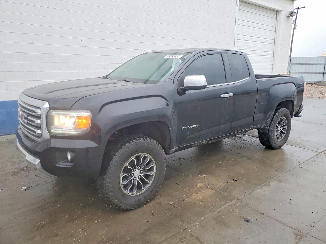 2015 GMC Canyon 4WD SLT, VIN 1GTH6CE33F1261647 — Rear end