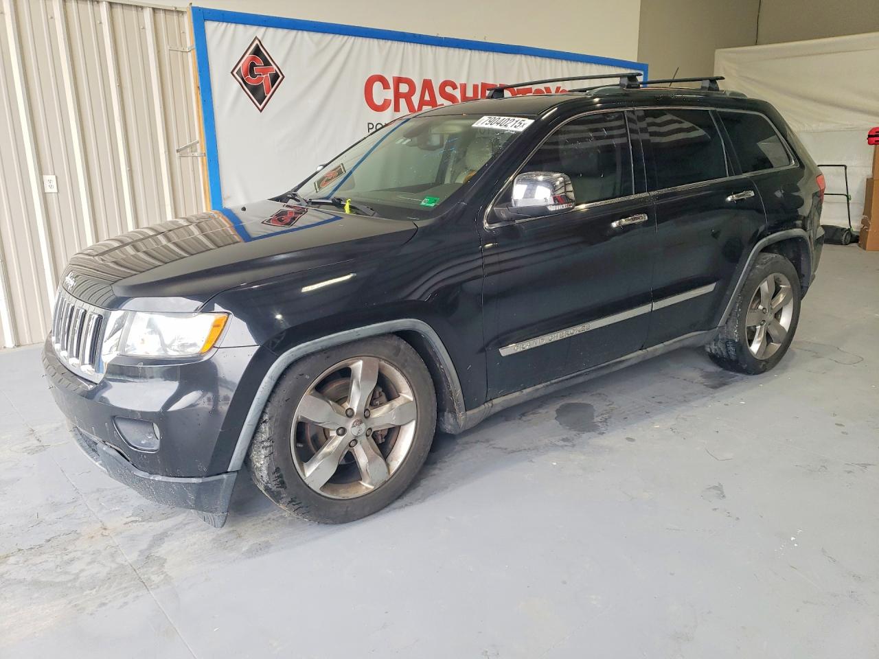 2011 Jeep Grand Cherokee Overland, VIN 1J4RR6GG0BC603447 — Minor dents and scratches