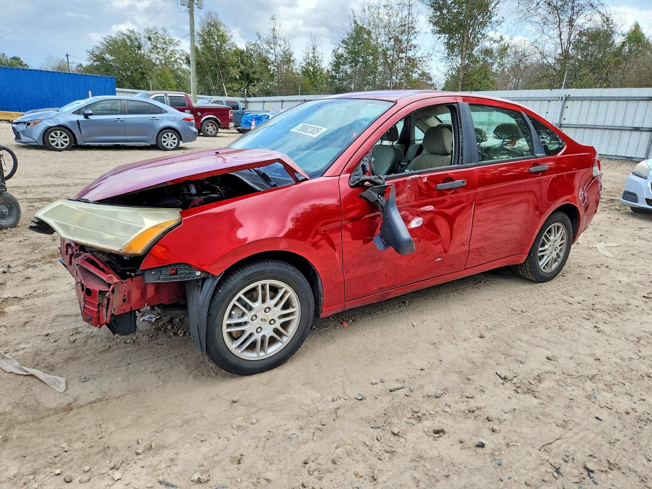 2010 Ford Focus SE, VIN 1FAHP3FNXAW122386 — Front end