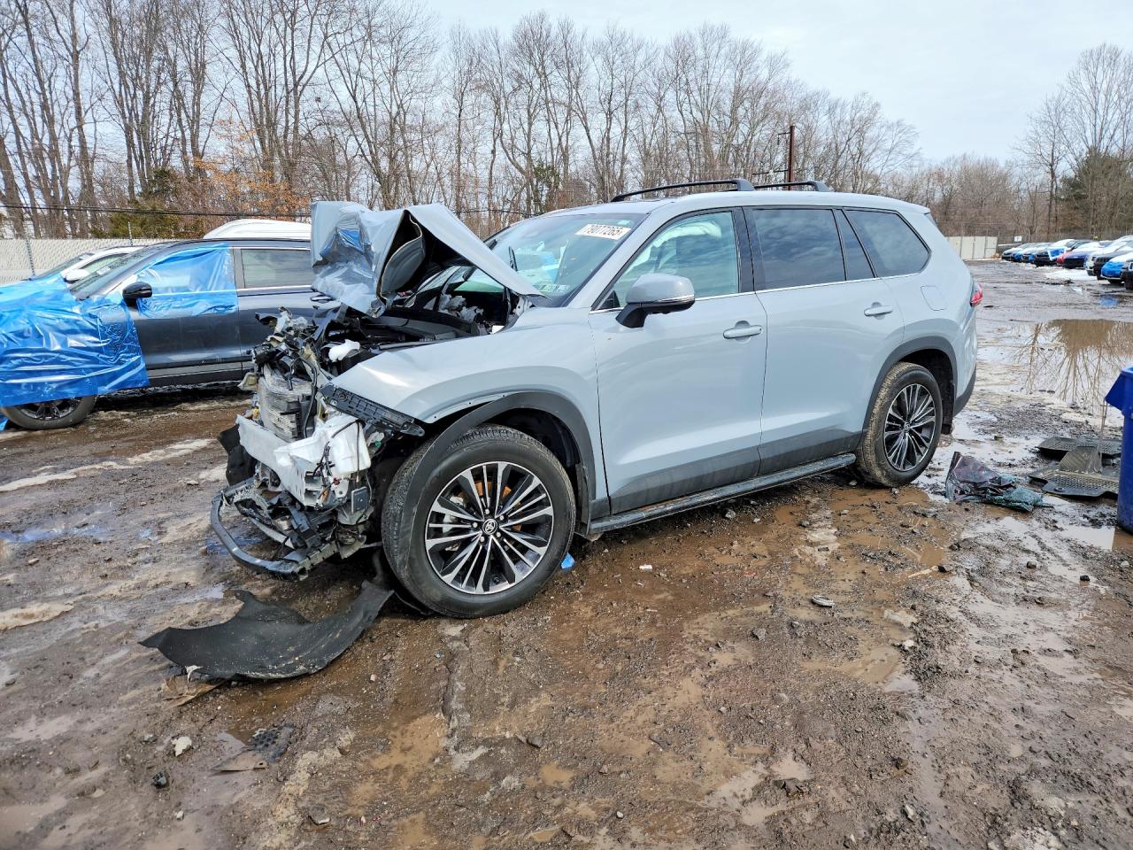 2026 Toyota Grand Highlander Hybrid MAX Platinum, VIN 5TDADAB54TS028912 — Перед