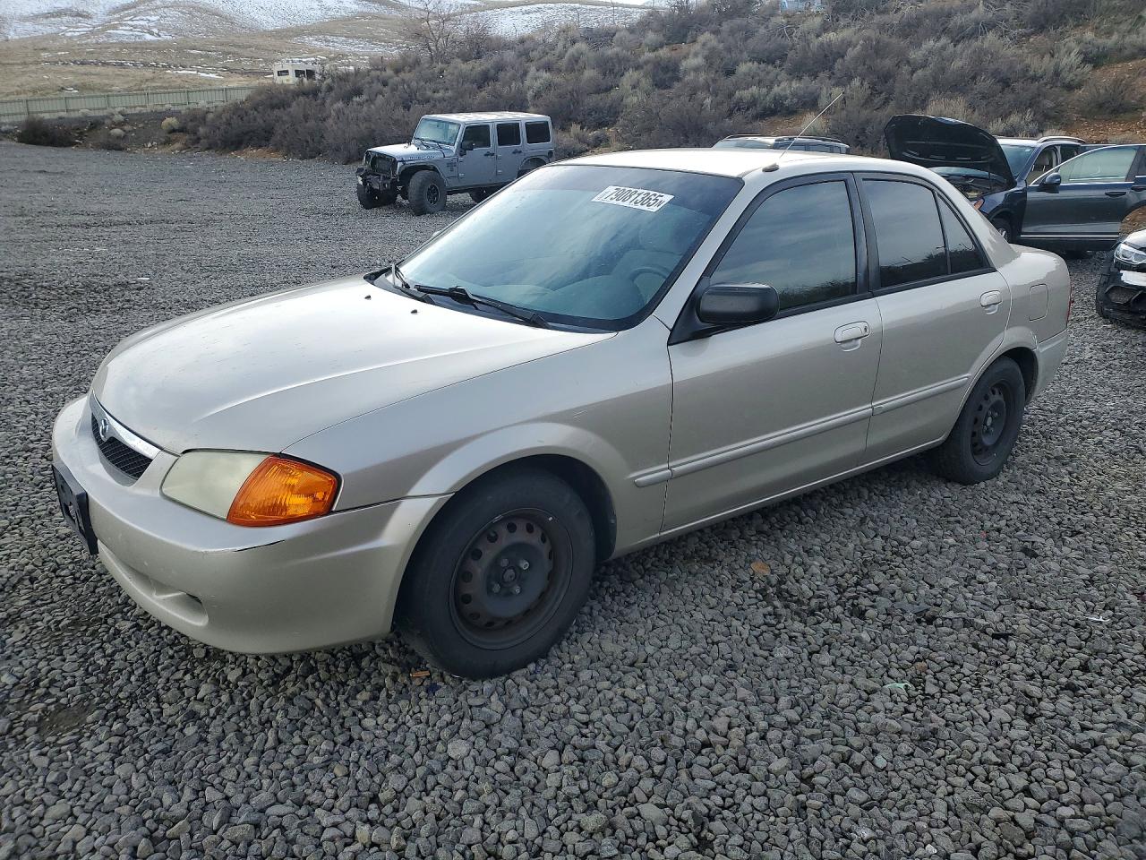 1999 Mazda Protege DX, VIN JM1BJ2227X0131453 — Мелкие вмятины и царапины