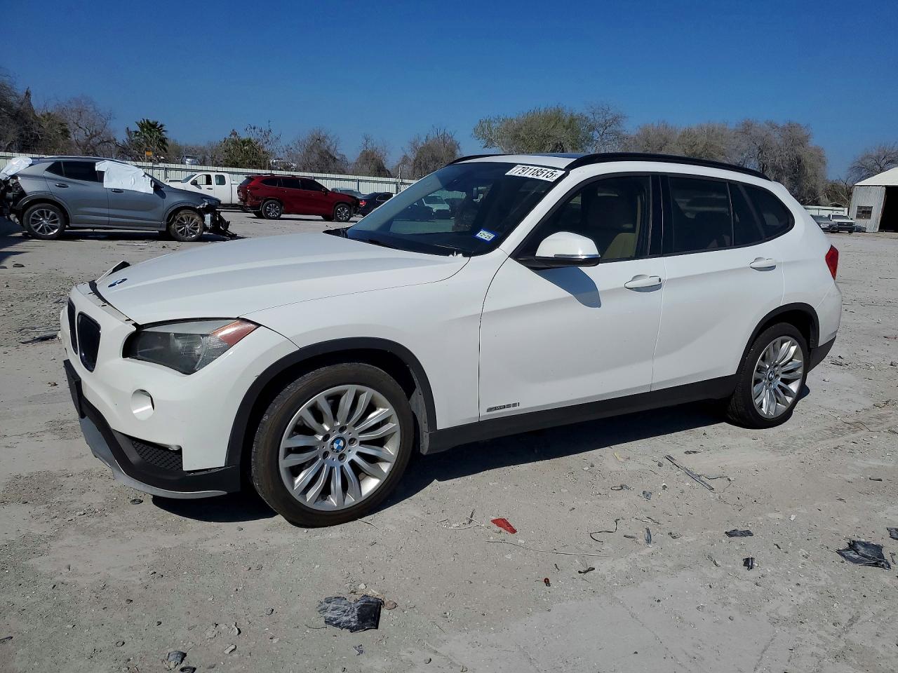 2015 BMW X1 sDrive28i, VIN WBAVM1C53FVW58489 — Front end