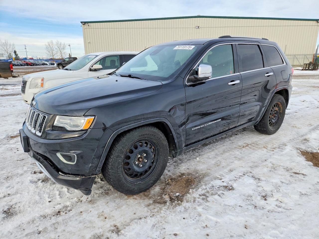 2014 Jeep Grand Cherokee Overland, VIN 1C4RJFCM4EC318893 — Фото с аукциона