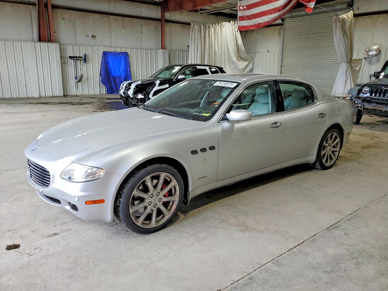 2006 Maserati Quattroporte, VIN ZAMCE39AX60023284 — Side