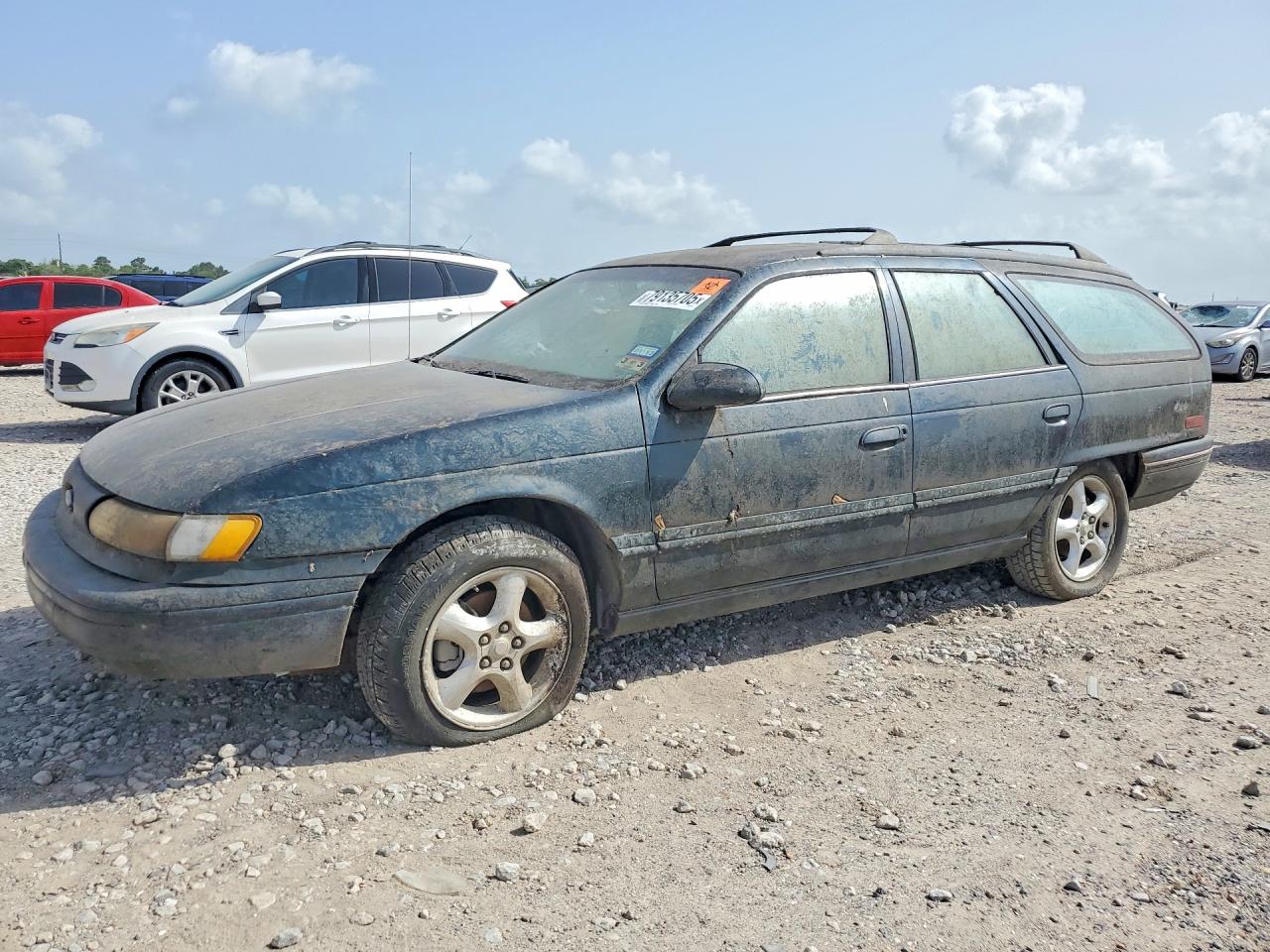 1994 Ford Taurus GL, VIN 1FALP57UXRA217745 — Rear end