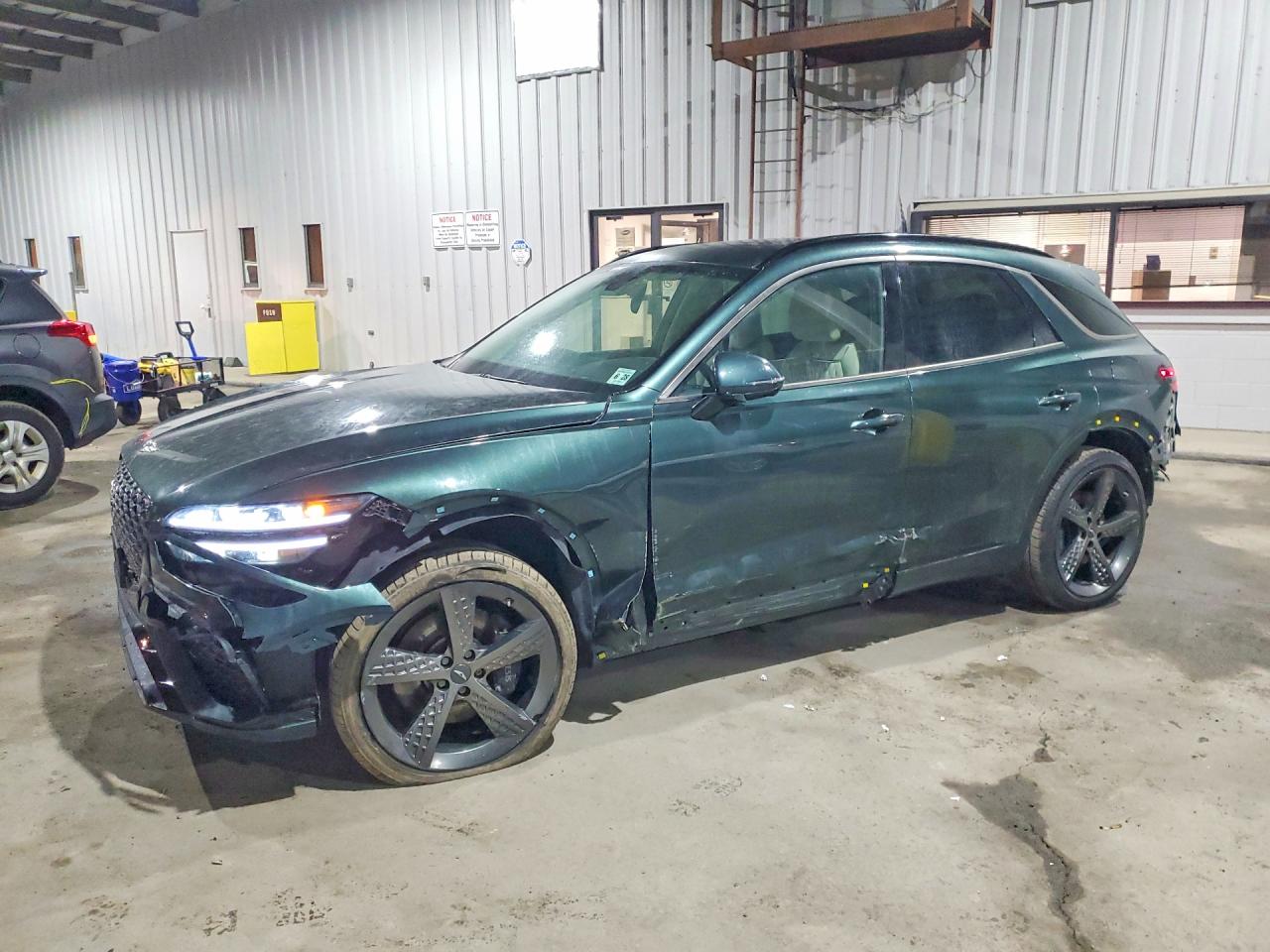 2023 Genesis GV70 Sport, VIN KMUMCDTC6PU124103 — Rear end