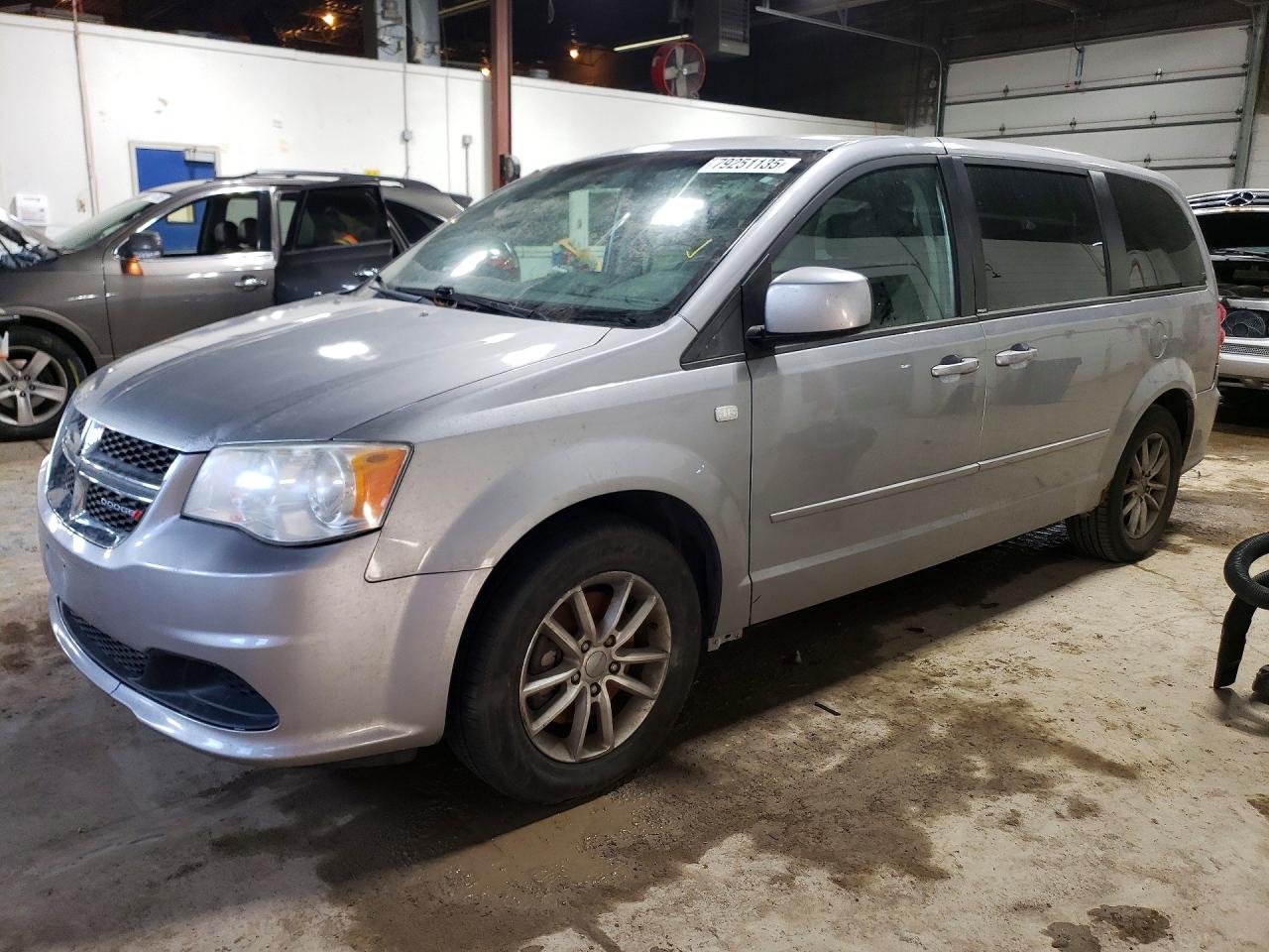 2014 Dodge Grand Caravan SE, VIN 2C4RDGBGXER200525 — Vandalism