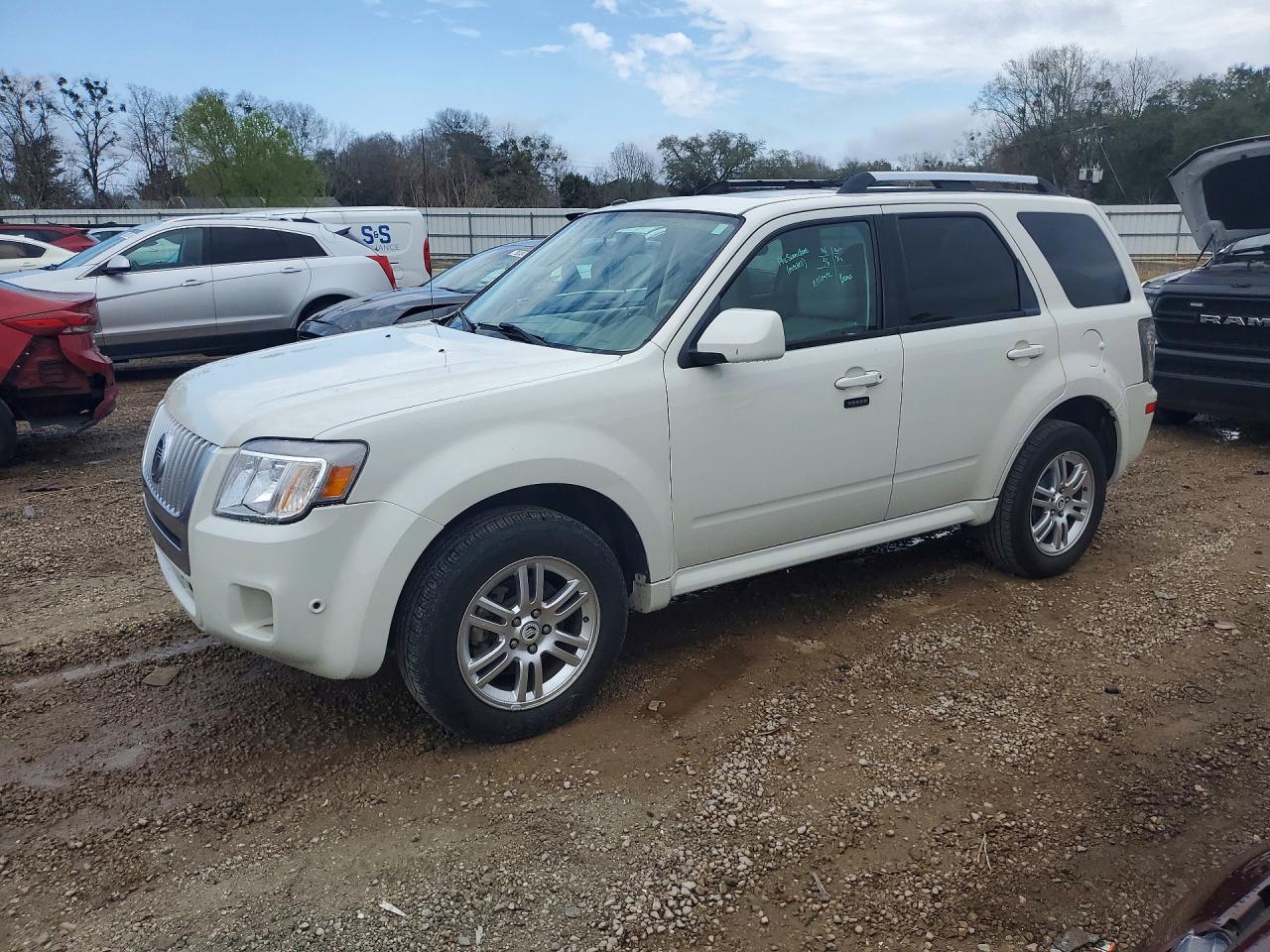 2010 Mercury Mariner Premier, VIN 4M2CN8H77AKJ20649 — Обычный износ