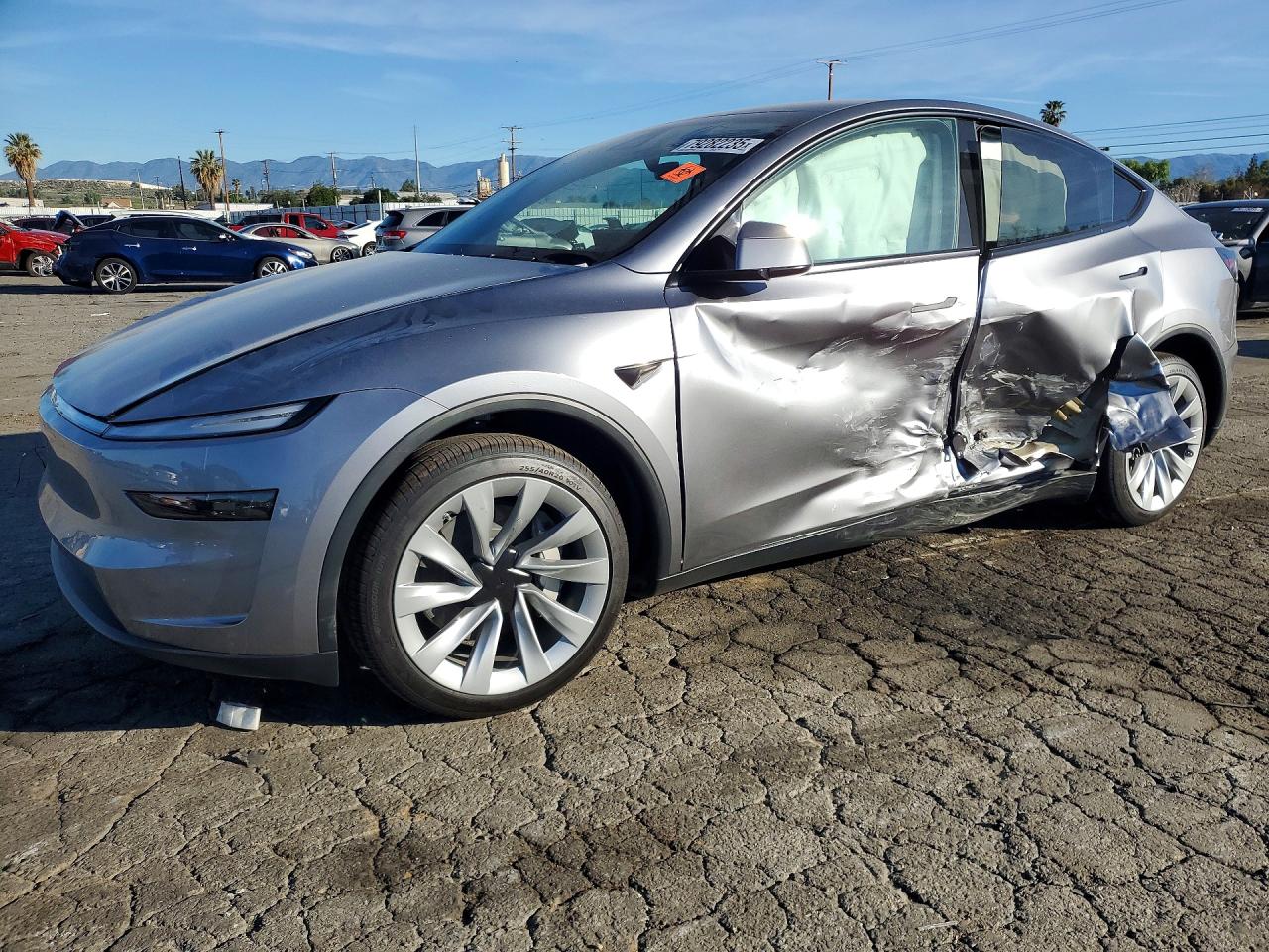 2026 Tesla Model Y Long Range Launch Series, VIN 7SAYGDEE6TF567705 — Side
