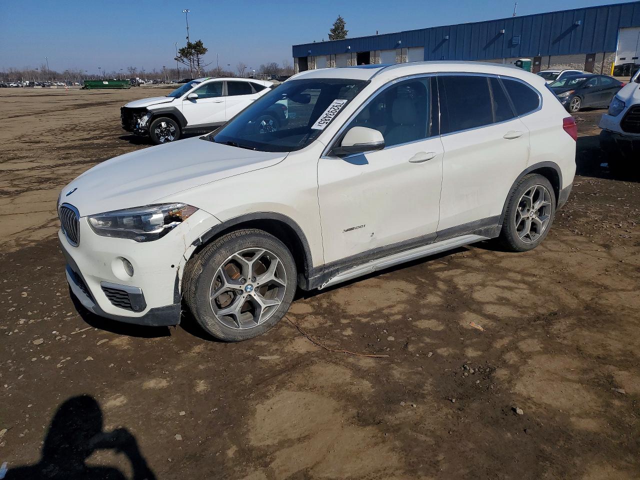 2016 BMW X1 xDrive28i, VIN WBXHT3C33GP880066 — Front end