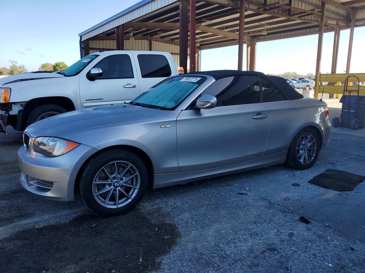2011 BMW 1 Series 128i, VIN WBAUL7C58BVM78999 — Side