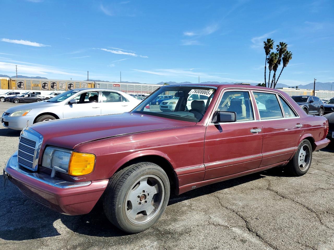 1990 Mercedes-Benz 560, VIN WDBCA39E7LA542039 — Minor dents and scratches