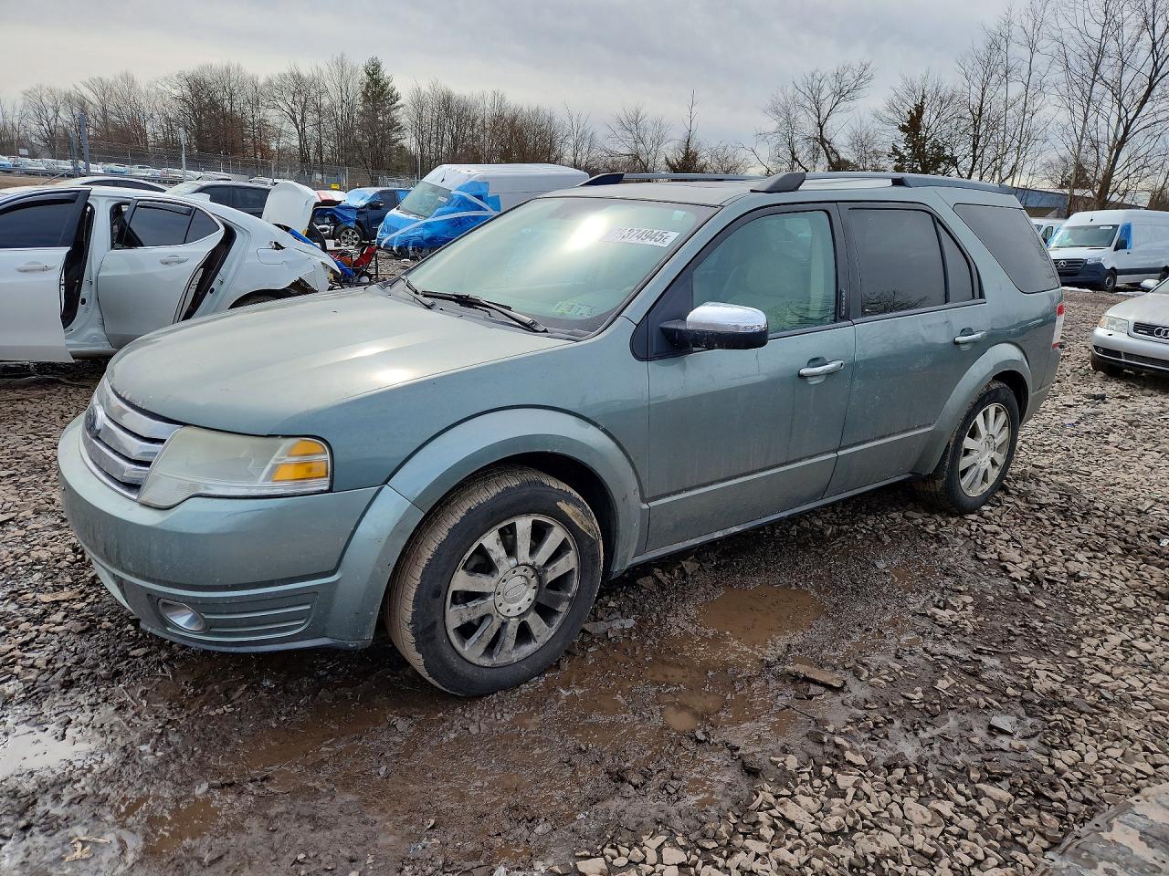 2008 Ford Taurus X Limited, VIN 1FMDK06WX8GA17796 — Side