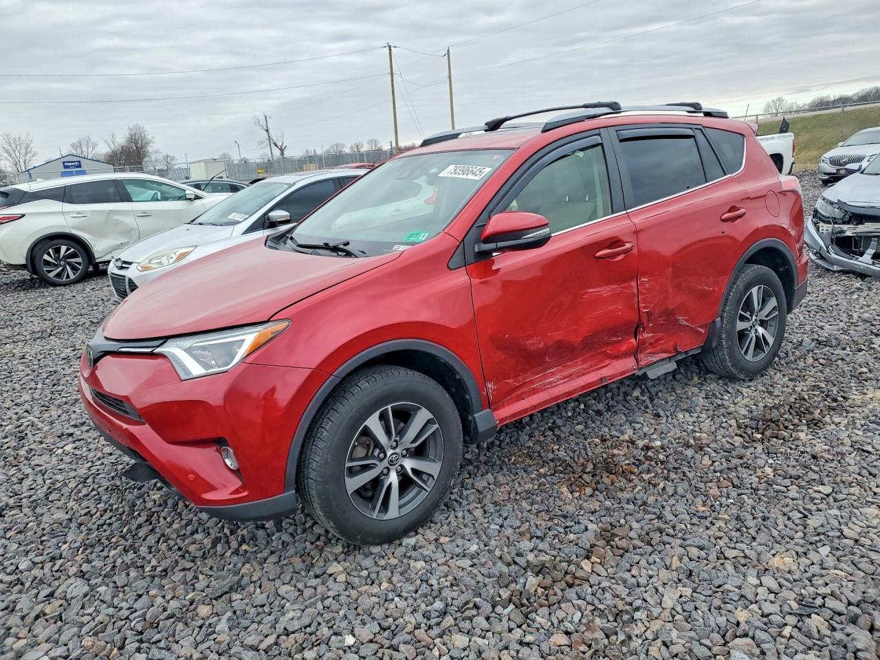 2017 Toyota RAV4 XLE, VIN JTMRFREV3HJ124090 — Side