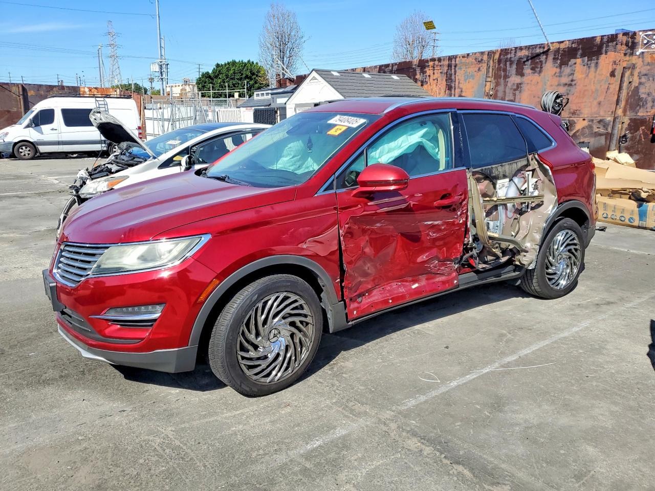 2015 Lincoln MKC, VIN 5LMCJ1A90FUJ09145 — Side