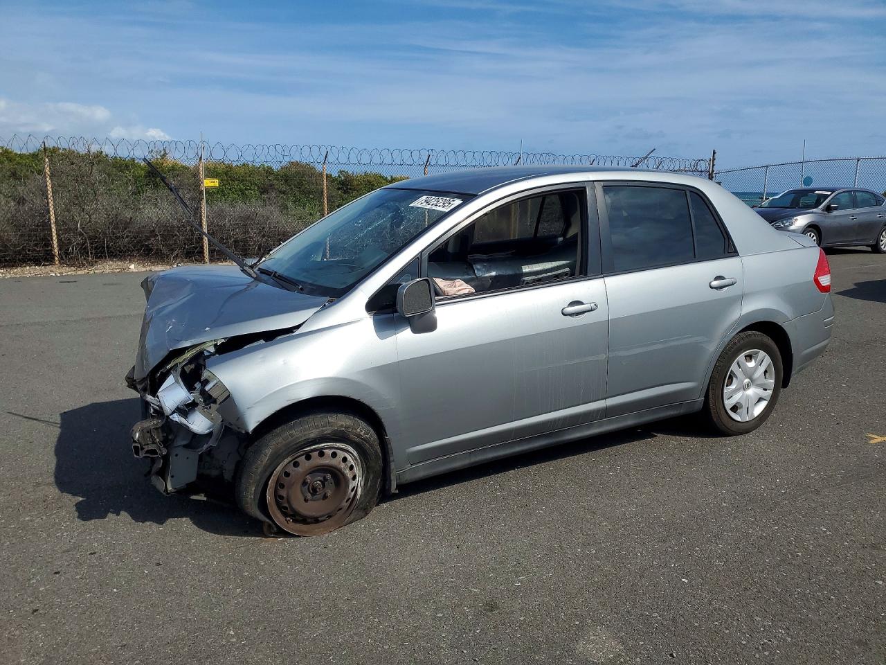 2010 Nissan Versa S, VIN 3N1BC1AP8AL401448 — Front end