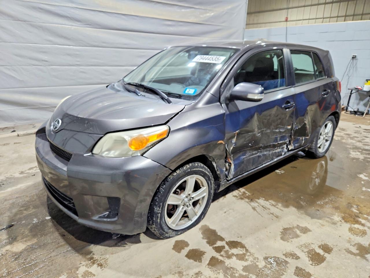 2010 Scion xD, VIN JTKKU4B46AJ051690 — Side