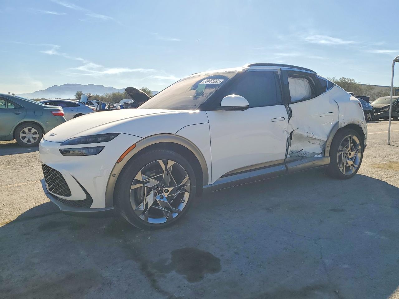 2023 Genesis GV60 Performance, VIN KMUKEDTB7PU013133 — Side