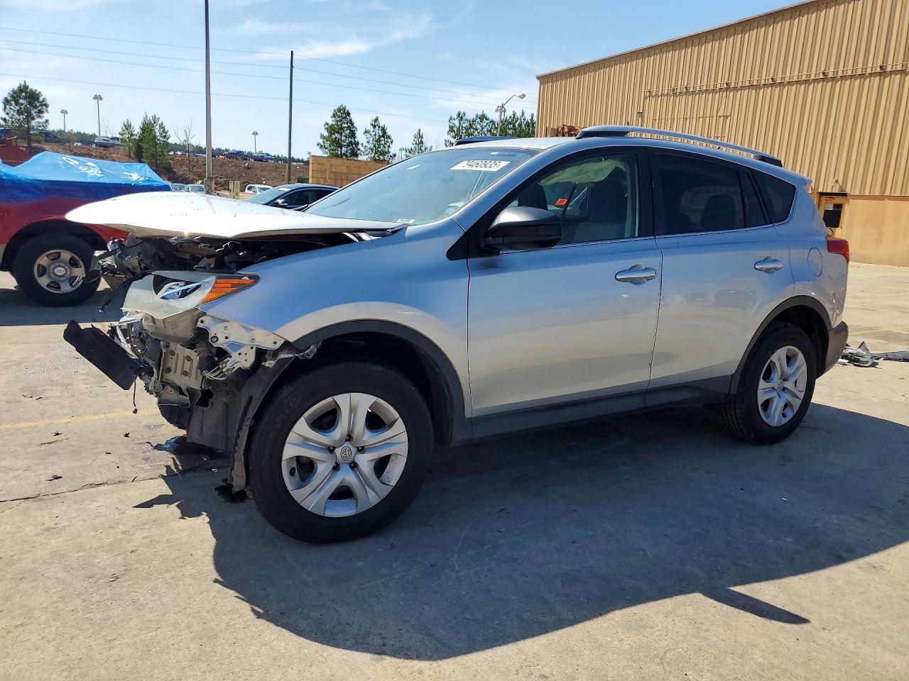 2014 Toyota RAV4 LE, VIN JTMZFREV0EJ023200 — Front end