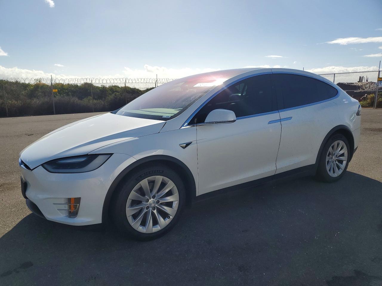 2017 Tesla Model X 90D, VIN 5YJXCAE26HF057192 — Rear end
