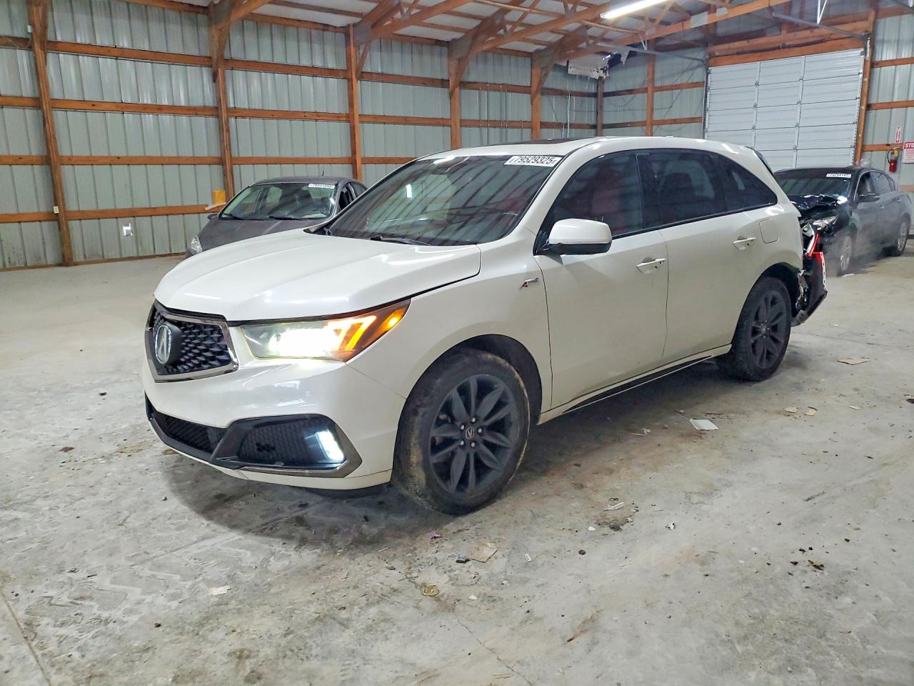 2019 Acura MDX Technology, VIN 5J8YD4H08KL014928 — Rear end