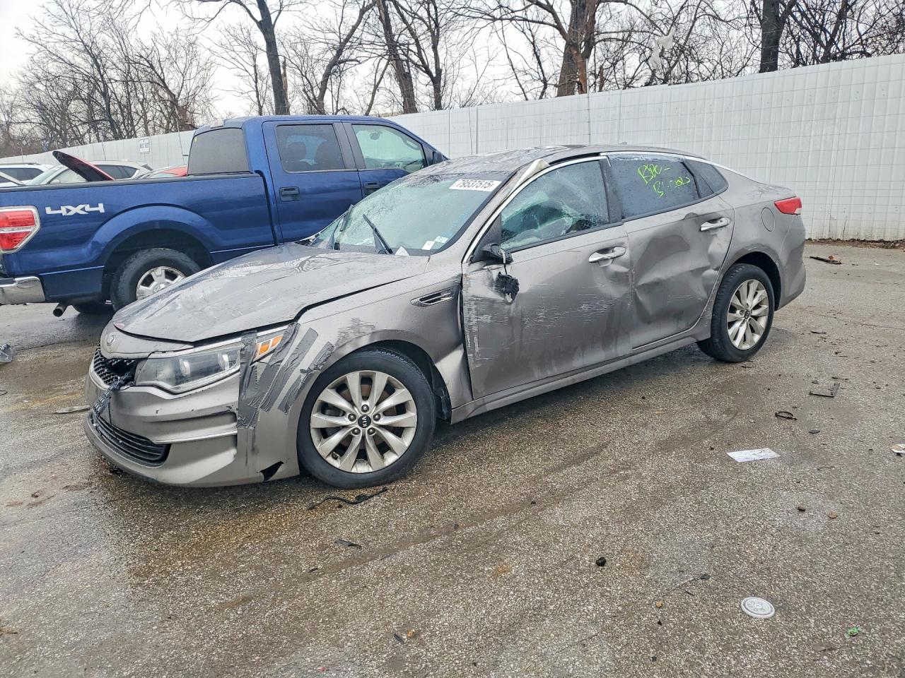 2016 Kia Optima EX, VIN 5XXGU4L32GG091474 — Rollover
